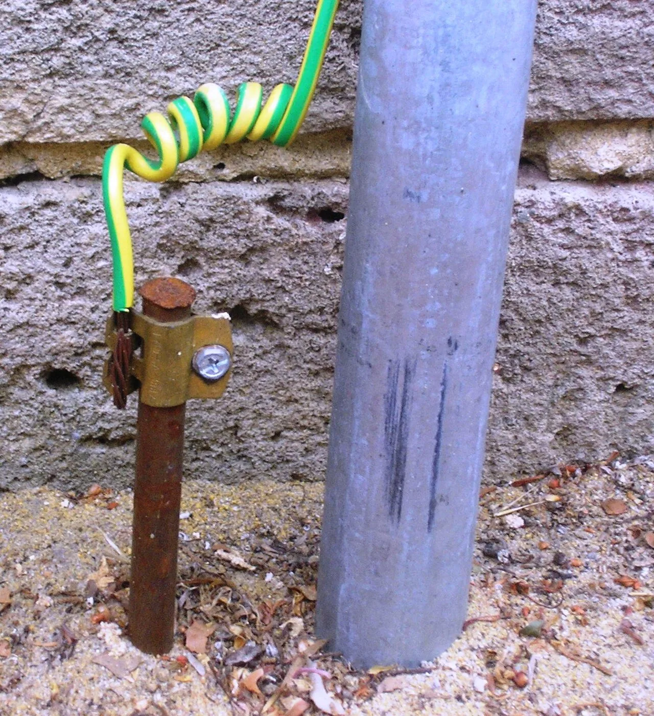 Grounding electrode rod installed at a building