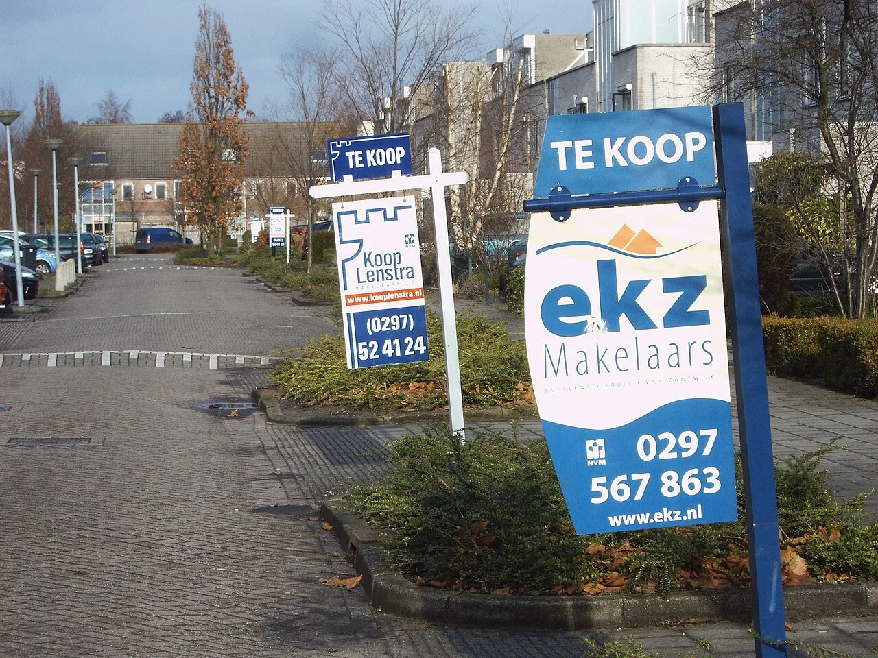 Houses for sale with estate agent signs