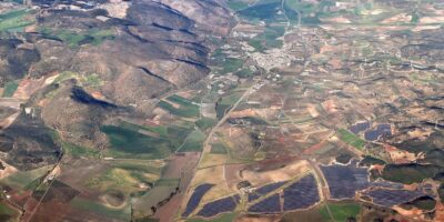 Photovoltaic array in an open field