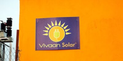 Solar farm with rows of photovoltaic modules