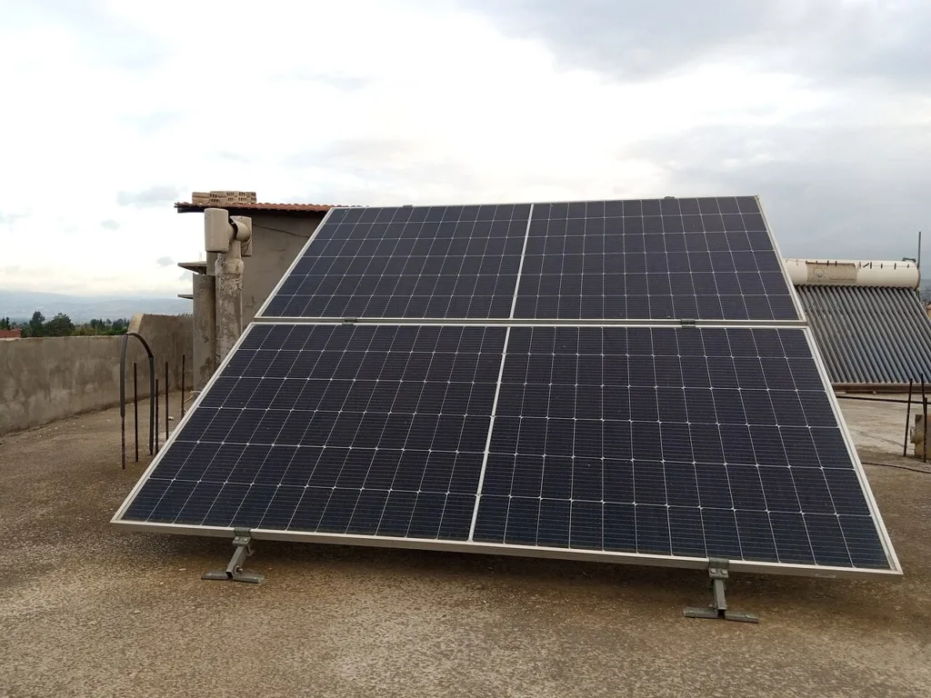 Residential rooftop photovoltaic array on a house