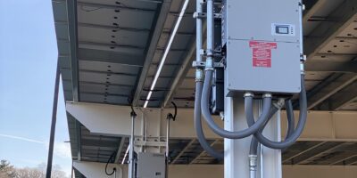 Bank of wall-mounted solar array inverters